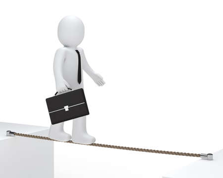 businessman with briefcase to balance on a ropeの写真素材