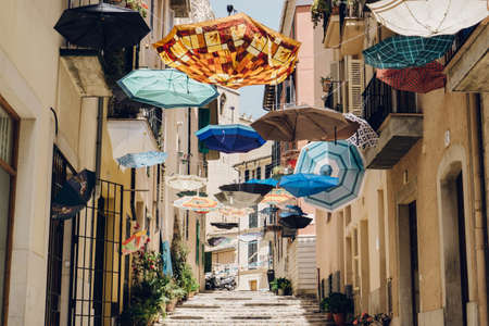 City stairs street with hang umbrellaの写真素材
