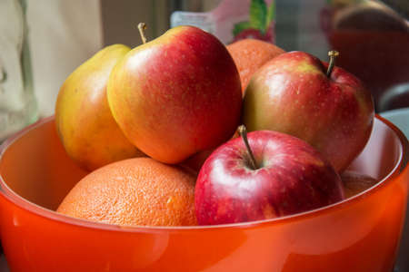 Fresh and large apples in a bowl - closeupの写真素材