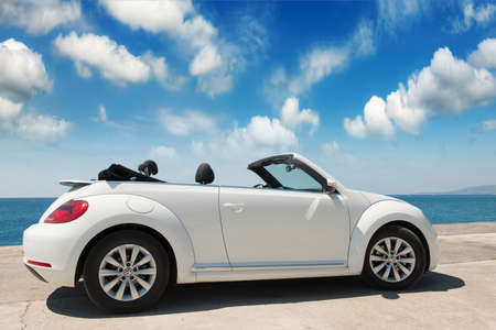 GREECE. ISLAND RODOS- June 16, 2013. The car is a Volkswagen convertible on the waterfront of the...