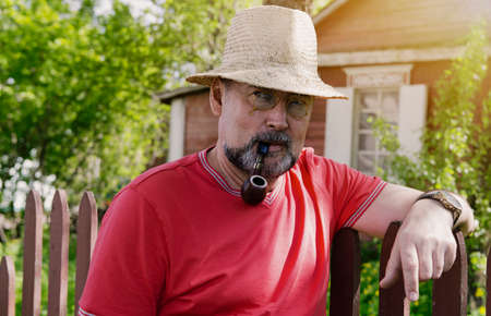 A man with a beard, in a golden pince-nez of the 19th century, の写真素材