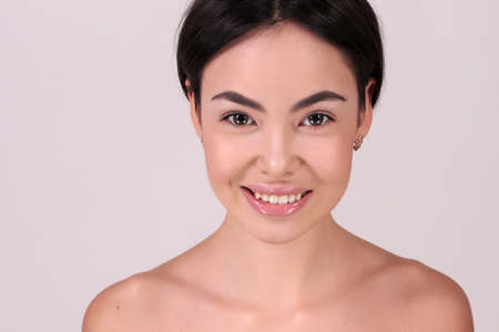 fashion interior photo of beautiful woman with dark hair and natural look