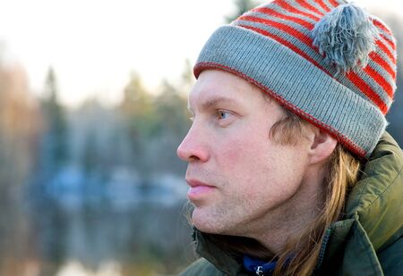 Portrait of man in winter cap outdoor
