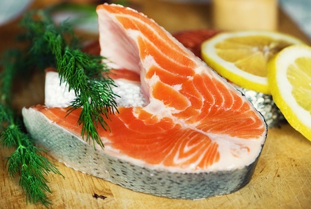 Piece of salmon, lemon and fennel