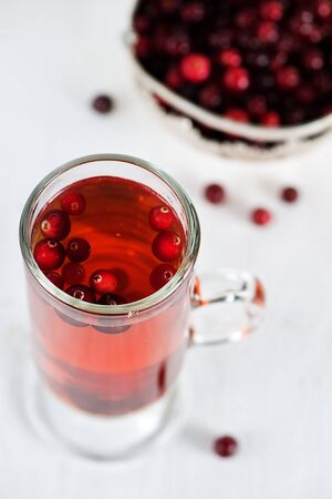Red tea with cranberry in the glassの写真素材