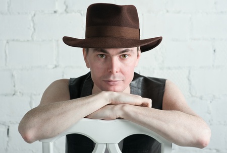 Portrait of attractive man in brown hat の写真素材