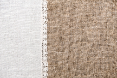Burlap background and linen cloth with laceの写真素材