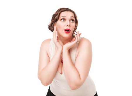 Beautiful plus size woman posing on white backgroundの写真素材