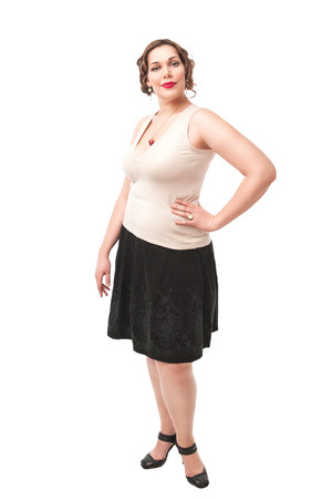 Beautiful plus size woman posing on white backgroundの写真素材