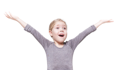 Happy beautiful little girl isolated over white backgroundの写真素材