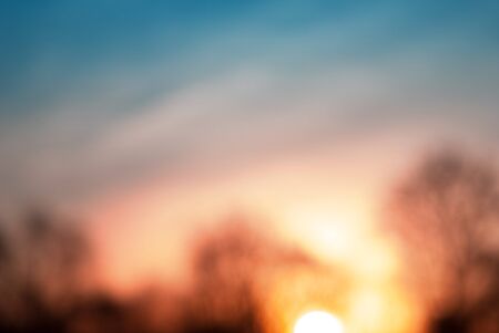 Blurred abstract beautiful colorful nature sunset backgroundの写真素材
