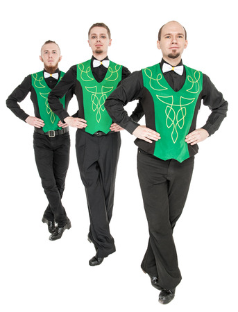 Group of irish dancers isolated on whiteの写真素材