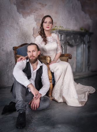 Young lovely wedding couple in retro styleの写真素材