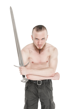 Young handsome man with sword isolated on whiteの写真素材