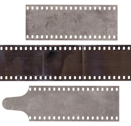 Set of various strip old film with dust and scratches isolated on whiteの写真素材