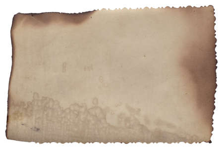 Old vintage rough texture retro paper with burned edges, stains and scratches backgroundの写真素材
