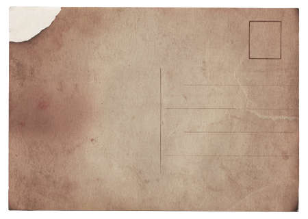 Blank old vintage postcard with burned stains isolated on white background