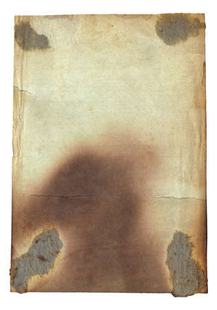 Old vintage rough texture retro paper with burned stains and scratches background isolatedの写真素材