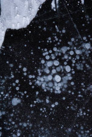 Ice texture with scratches and frozen snow. Winer abstract background for designの写真素材