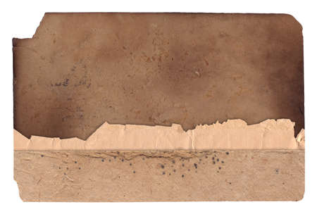 Old vintage rough texture retro paper with burned edges, stains and scratches backgroundの写真素材