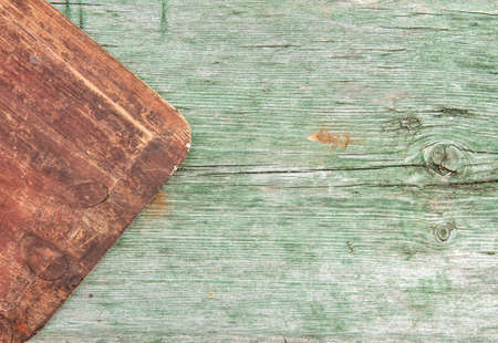 Vintage wooden background with old rough grunge green and red boardの写真素材