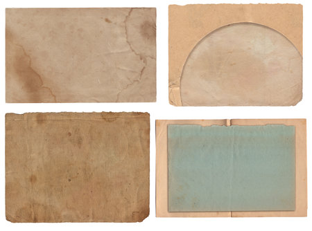 Set of various Old papers and postcards with scratches and stains texture isolated on whiteの写真素材