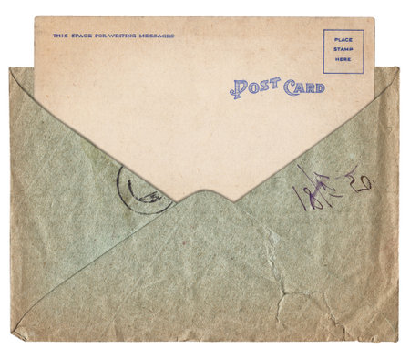 Vintage paper background with old envelope and postcard isolated on white backgroundの写真素材