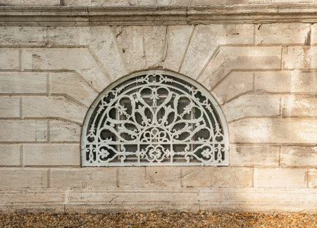Old wall with ancient decorative pattern lattice window background textureの写真素材