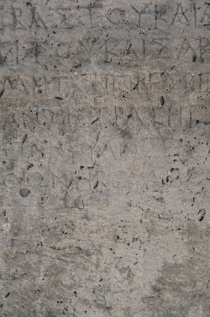 Ancient stone wall texture background with antique text