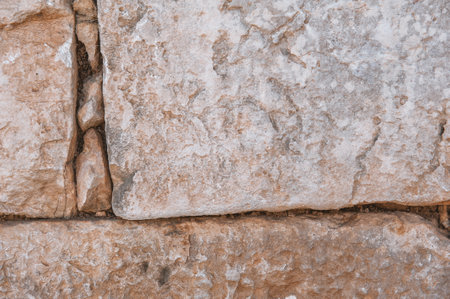 Ancient wall texture background with old concrete bricksの写真素材