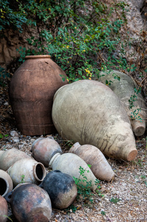 Ancient Armenian rustic wine jugs used for traditional fermentationの写真素材