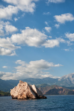 Breathtaking coastal landscape in Turkey with turquoise waters and pine-covered mountainsの写真素材