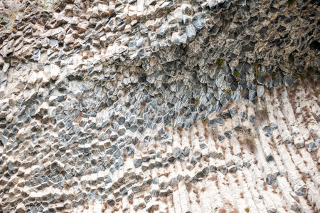 The Symphony of Stones in Garni, Armenia, hexagonal rock formations showcase the rugged beauty of...