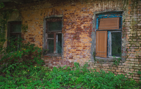 Old ancient ruins of abandoned bricks building with windowsの写真素材