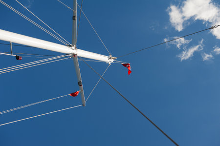 Sailing mast with ropes and Turkish flag against clear blue sky