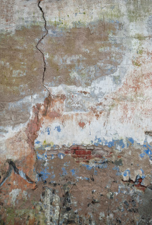 Cracked vintage wall with textured surface and rustic charmの写真素材