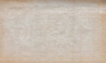 Vintage background of old ancient torn paper texture with spotsの写真素材