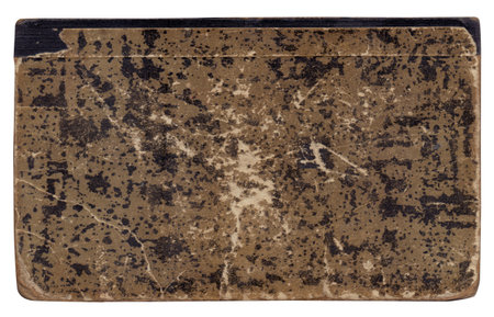 Vintage background of old book cover torn paper texture with scratches isolatedの写真素材