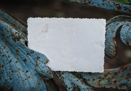 Blank old empty paper lies on rusty metal with vintage grunge texture