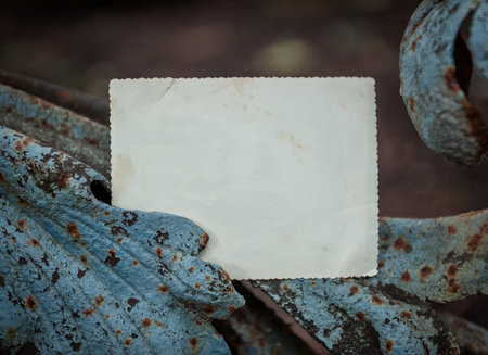 Blank old empty paper lies on rusty metal with vintage grunge textureの写真素材