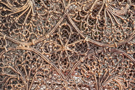 Close view of wrought iron ornament with antique pattern and rustic texture