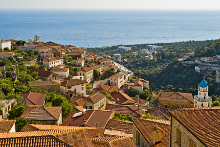 The picturesque greek style village of Dhermi at the coastal road of Albaniaの写真素材