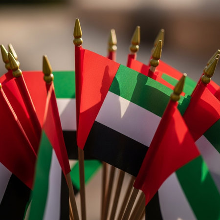 Flags of the United Arab Emirates and the United Arab Emirates on a stickの写真素材