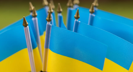 Ukrainian flag with blue and yellow stripes. Selective focus.