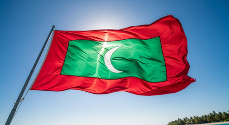Maldives flag waving in the wind on a sunny day.の写真素材