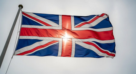 Flag of the United Kingdom (UK) waving in the wind.の写真素材