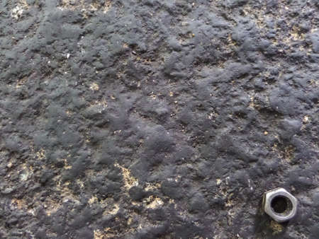 Knot on dirty floor in garageの写真素材