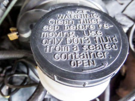 Text caution on top of oil break tankの写真素材