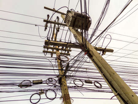 Power electric lines in the blue skyの写真素材