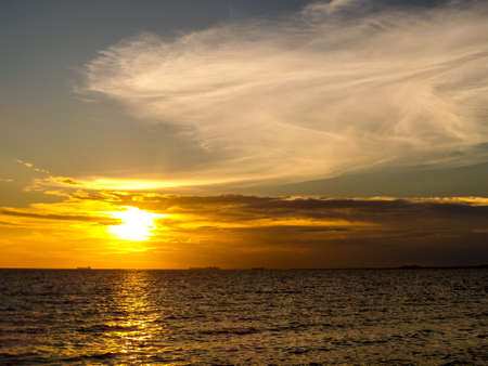 Sunset and cloud on horizon at banglamung beachの写真素材